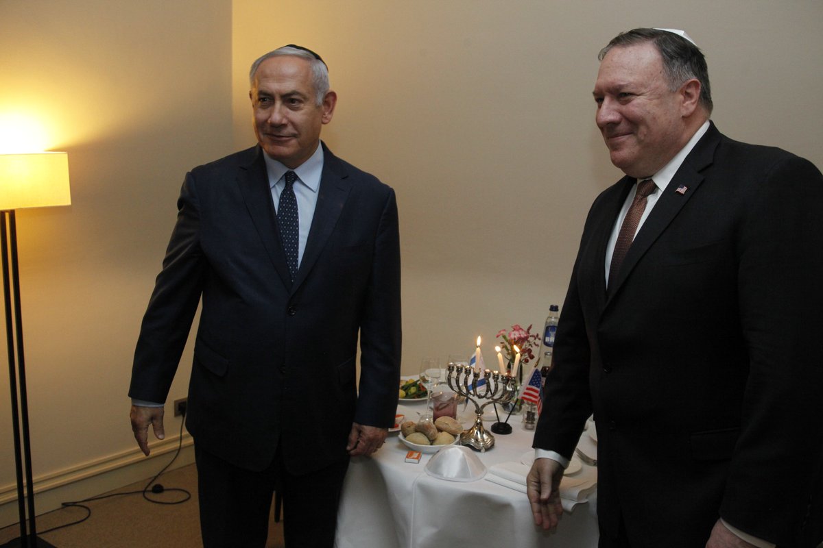 Prime Minister Benjamin Netanyahu and US Secretary of State @SecPompeo lit the second hannukah candle together at the start of their meeting this evening  in Brussels.   