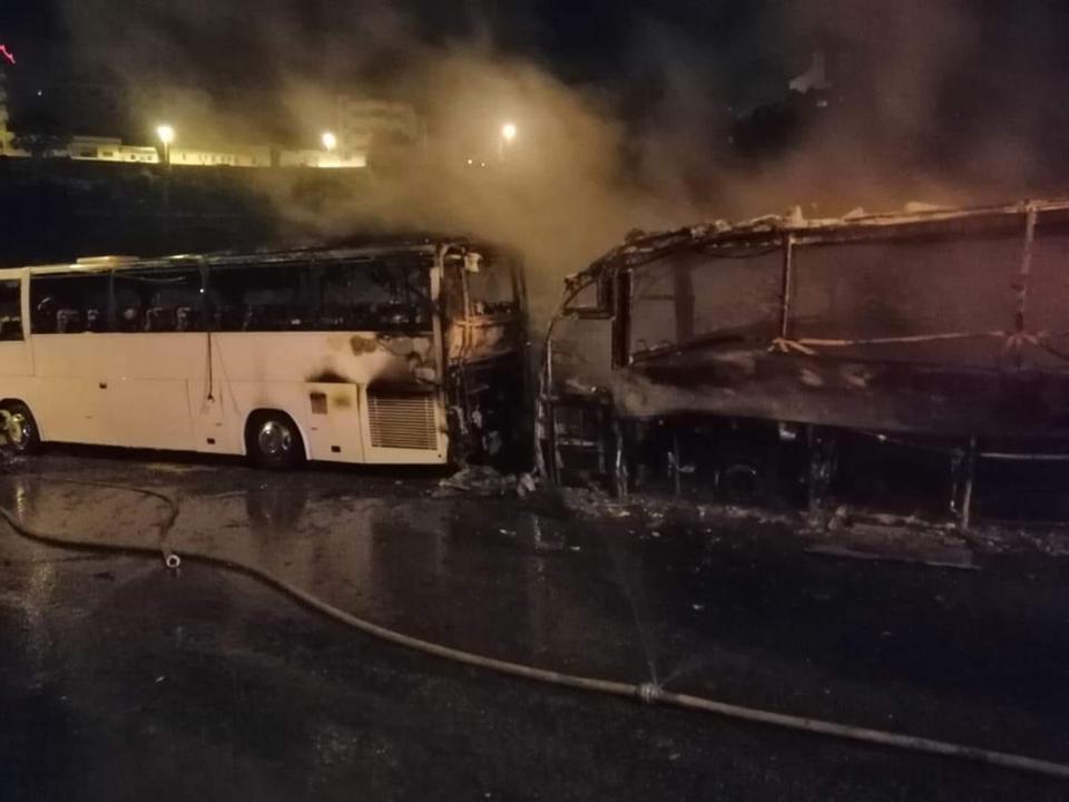 Two buses caught fire in front of a hotel in Bethlehem, south of the West Bank