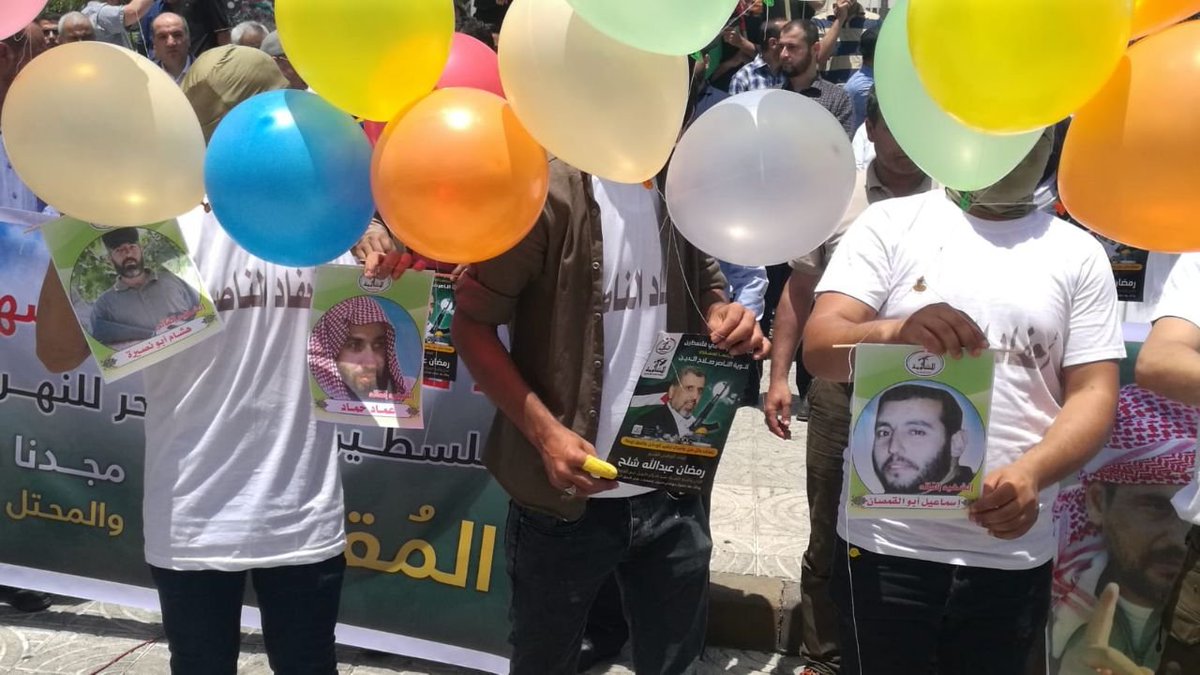 Gaza balloon unit releases balloons with pictures of the late PIJ leader Ramadan Shallah and other militants