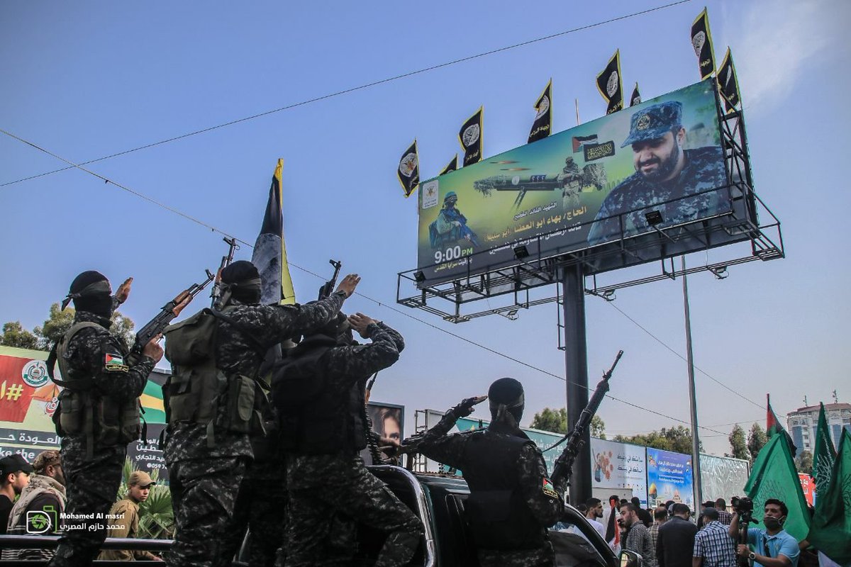 PIJ parade in Gaza mourning the death of Ramadan Shallah, the former leader of Palestinian Islamic Jihad.  9:00PM seen on the large poster, the time PIJ usually fires rockets at Israel