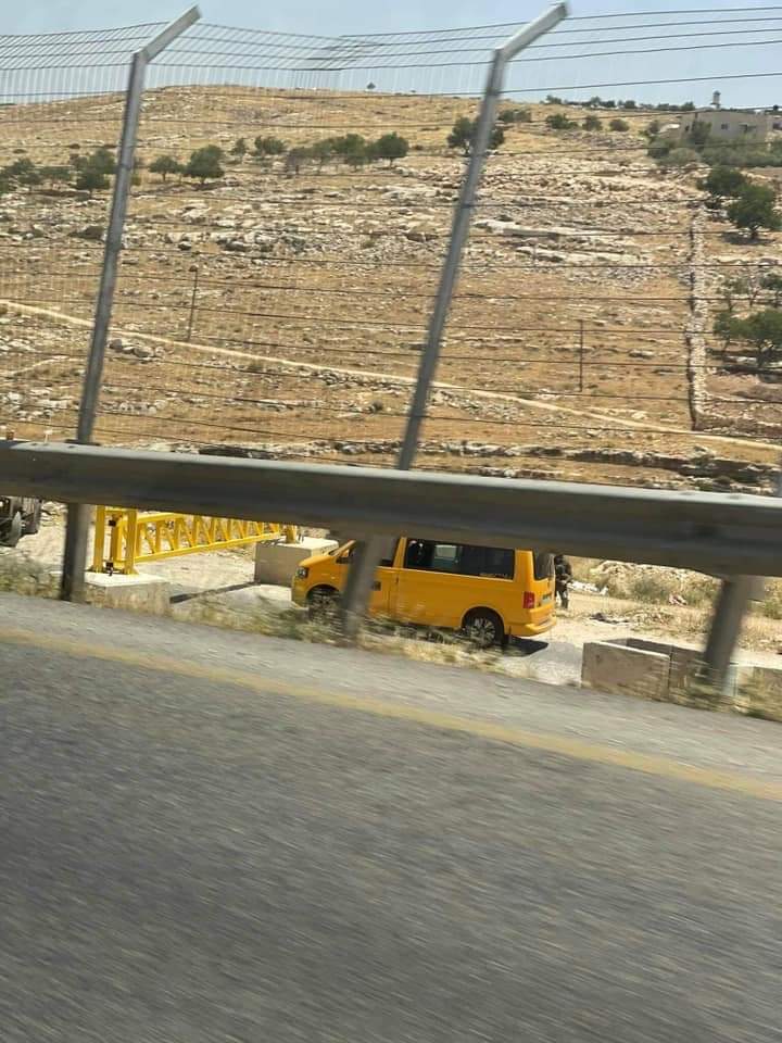 Troops block the northern entrance to Tuqu ', southeast of Bethlehem, with the iron gate.