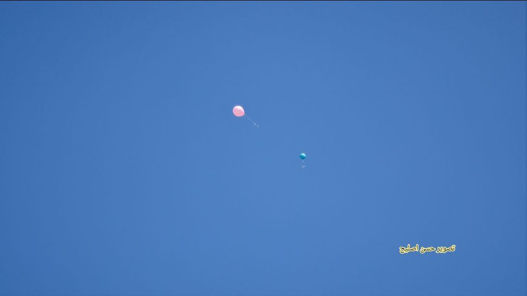 Palestinians launch balloons carrying incendiary devices from Gaza a short while ago. No reports of fires in southern Israel as of now