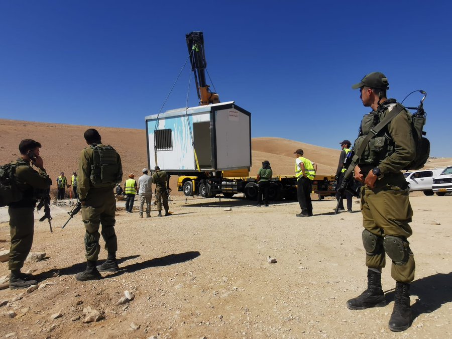 MSF: Today, Israeli forces confiscated a community's trailer, which served as our mental health consultation room, in Um Qusa in Hebron province. Thread  Photo: Nasser Nawaj'ah, B'Tselem