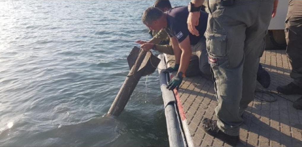 Photos of the rocket found off the port of Jaffa earlier today