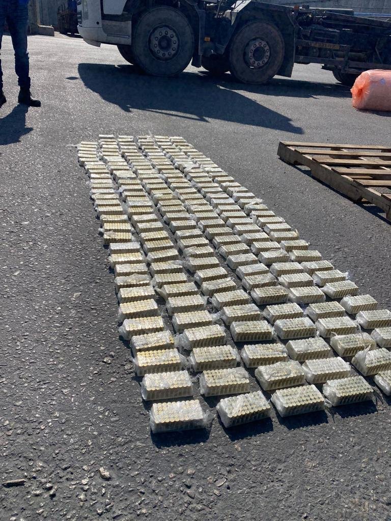 Defense Ministry says some 10,000 bullets en route to Gaza were seized at Kerem Shalom crossing, hidden in false bottoms of garbage cans