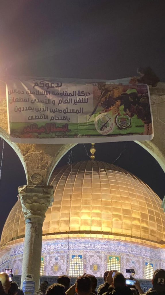 A banner reading Hamas calls on you to mobilize and repel the herd of settlers who are threatening to invade al-Aqsa, is placed near the Dome of the Rock on the Temple Mount