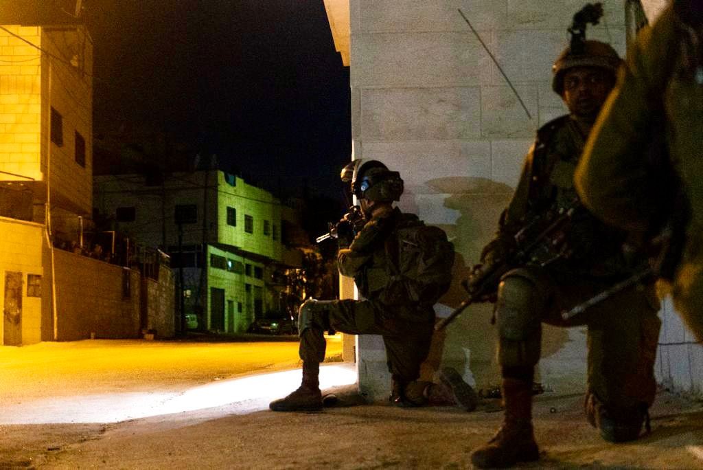 Israeli army says troops arrested 18 Palestinians suspected of involvement in terror activities during overnight raids in the West Bank