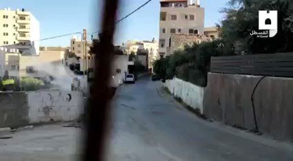 Clashes erupt between young men and forces in the town of Abu Dis, east of Jerusalem