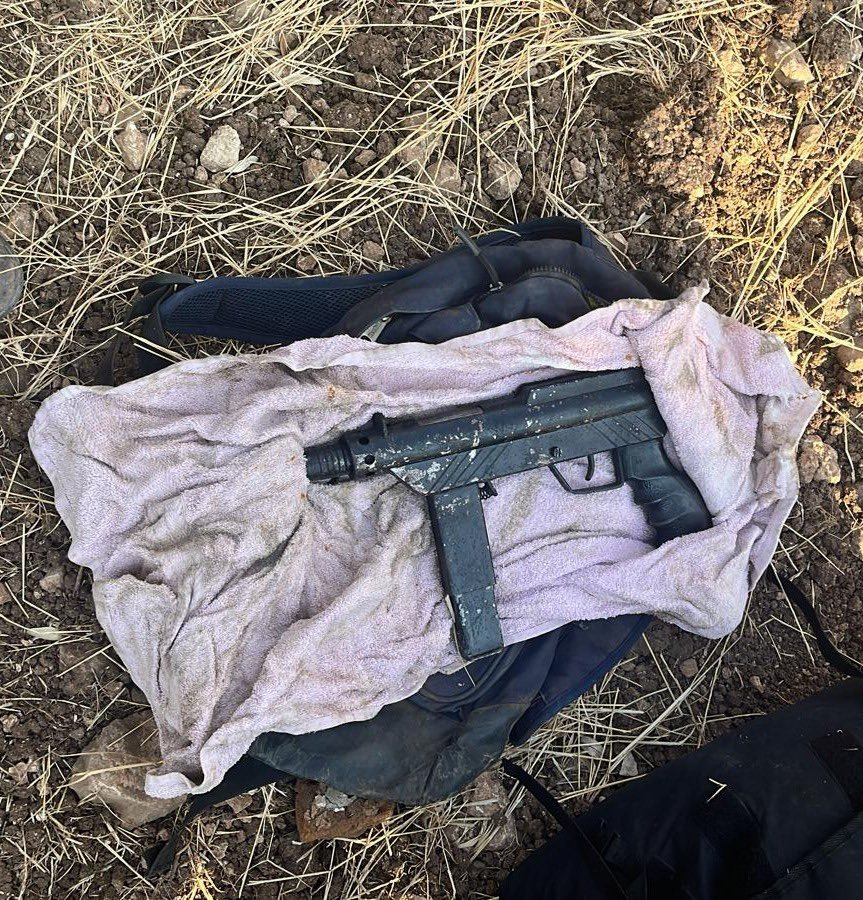 Israeli army says troops arrested two Palestinians along the West Bank security barrier near Baqa al-Gharbiyye, one was armed with a makeshift sub machinegun