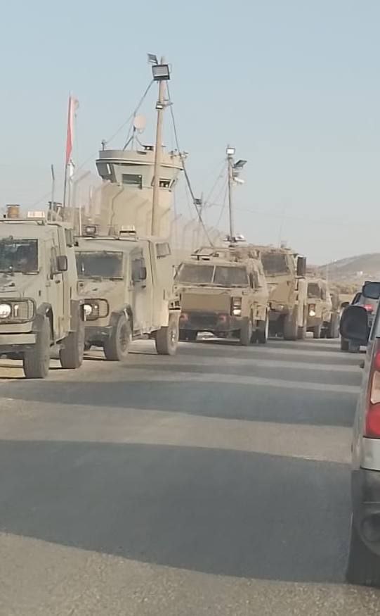 A picture of military vehicles belonging to the forces gathering at the Beit Furik checkpoint, east of Nablus, in the northern West Bank