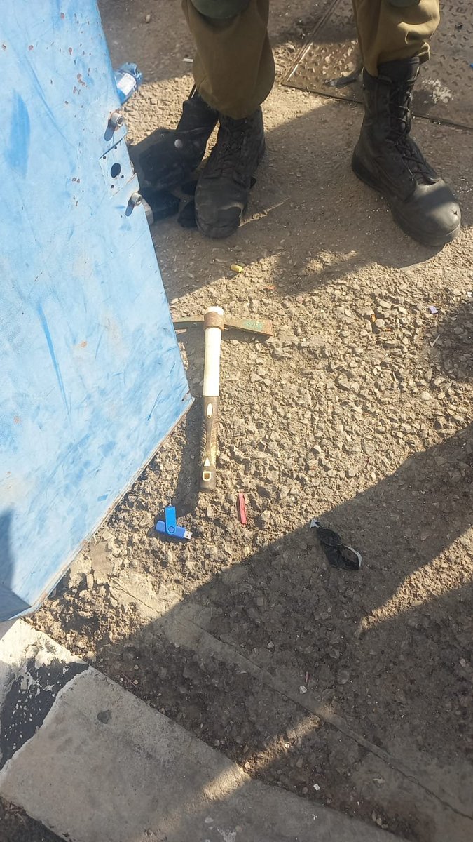 An Israeli army officer is seriously hurt after a Palestinian driver rammed his car into him at the Bell checkpoint near Modi'in, and then tried to attack him with an axe. Attacker shot dead