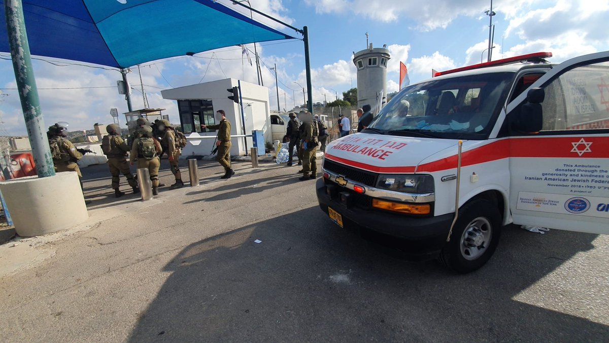 An Israeli army officer is seriously hurt after a Palestinian driver rammed his car into him at the Bell checkpoint near Modi'in, and then tried to attack him with an axe. Attacker shot dead