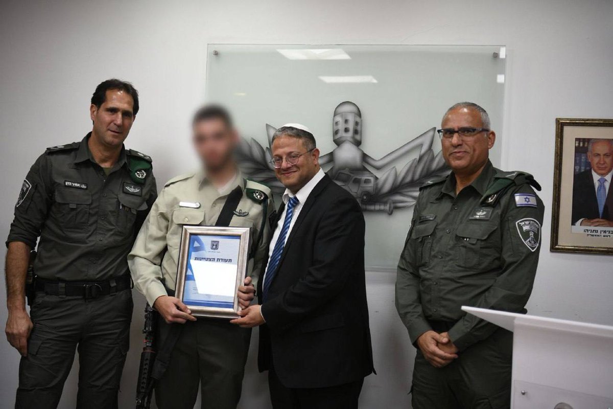 Israeli National Security Minister Itamar Ben Gvir honoring the ISF element who shot dead yesterday Palestinian youth in Shu'fat Refugee Camp NE of Jerusalem City