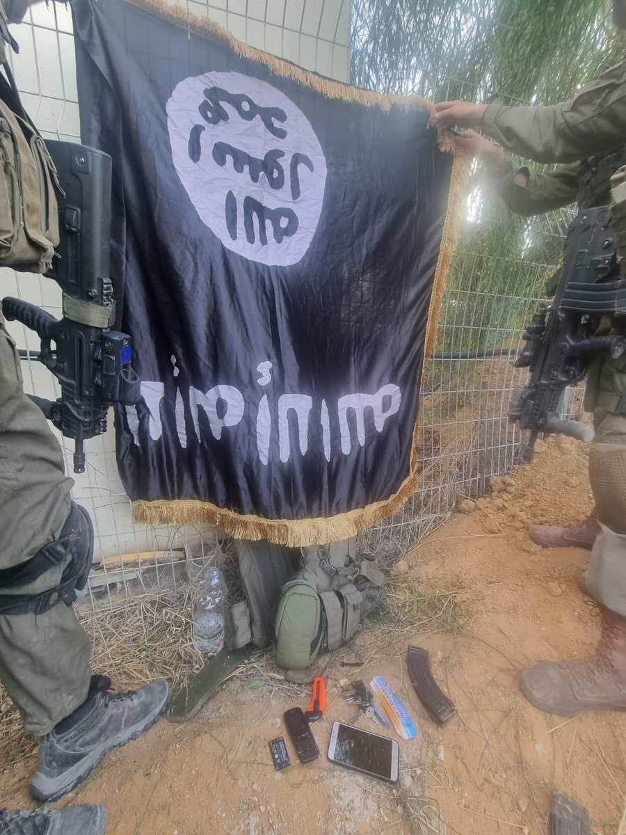 Israeli army officially confirms troops found an Islamic State flag among items belonging to Palestinian militants who attacked Kibbutz Sufa on Saturday morning