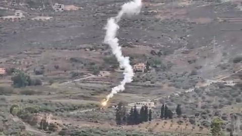 Incendiary shells on olive groves between the town of Kafr Kila and Deir Mimas