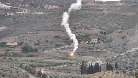 Incendiary shells on olive groves between the town of Kafr Kila and Deir Mimas