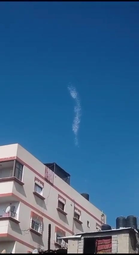 Planes drop leaflets in the sky of Khan Yunis, south of Gaza, now