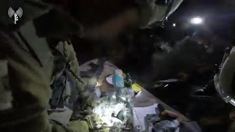 Israeli army releases footage of troops in a Hamas stronghold captured by the Givati brigade on Tuesday, in Jabaliya in the northern Gaza Strip. It says forces recovered intelligence materials that will be used by the Israeli army in future fighting.