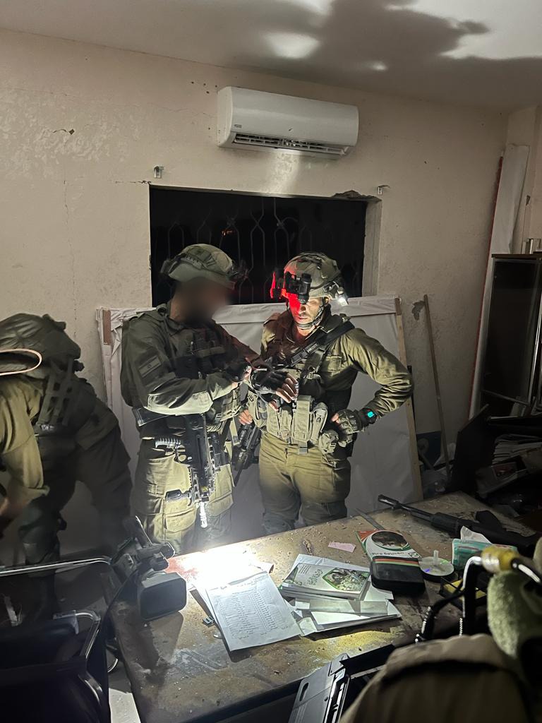 Israeli army reveals that it recovered Hamas operational plans, maps, command and control charts, communication devices, and the personal details of commanders and operatives in the terror group