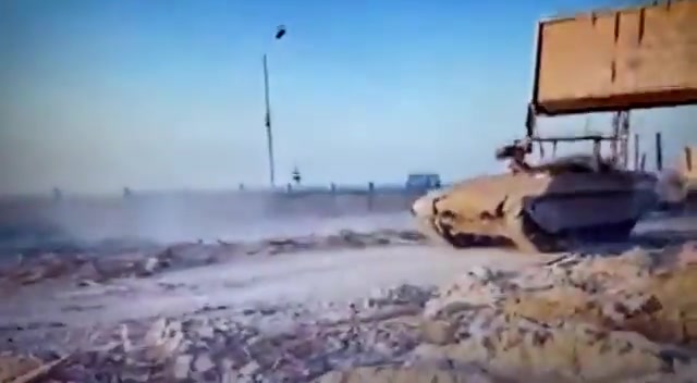 Video showing Al Qassam Brigades operatives destroying an Israeli tank invading Gaza