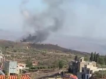 Black smoke rising from two places from the Al-Bayad site after Israeli military vehicle was targeted
