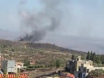 Black smoke rising from two places from the Al-Bayad site after Israeli military vehicle was targeted 