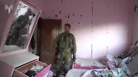 Israeli troops operating in the Gaza Strip have located a Hamas drone manufacturing plant and weapons depot within a residential building in Gaza City's Sheikh Radwan neighborhood, footage released by the Israeli army shows