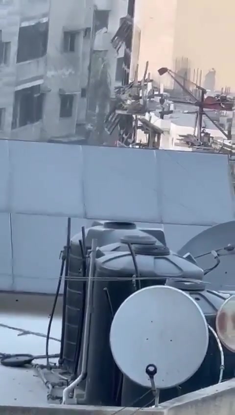 Israeli army tanks seen moving along Al Senaa Street, Gaza City