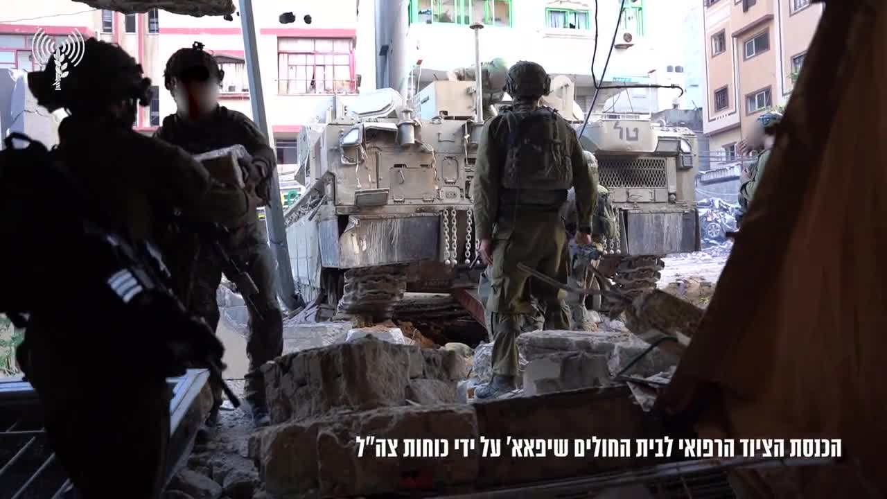 Israeli army releases footage of troops bringing humanitarian aid to Shifa Hospital