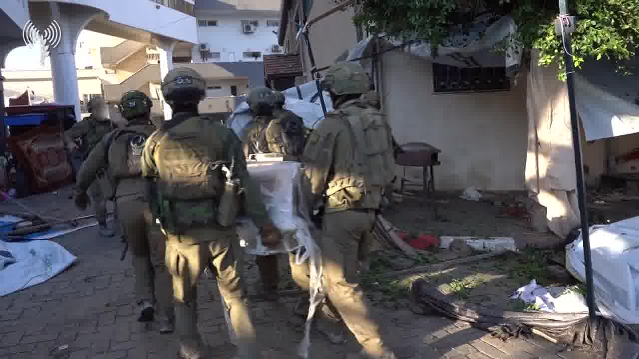 Israeli army releases footage of troops bringing humanitarian aid to Shifa Hospital