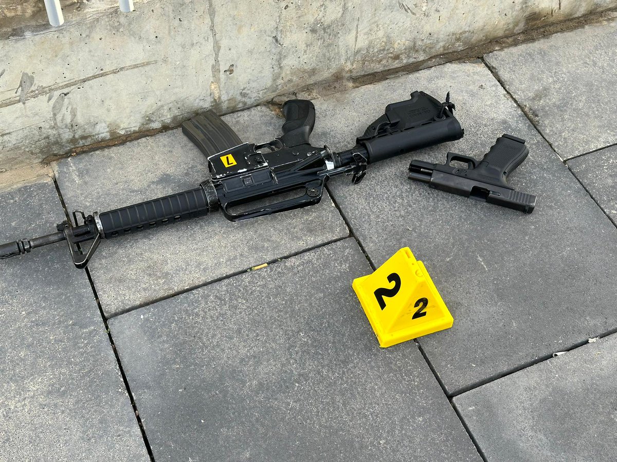 Police handout photo of the guns used by the militants in the attack at the entrance to Jerusalem