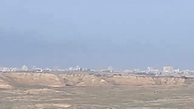 Near Kibbutz Beeri, Israel-Gaza border - Intense artillery fire on presumed terror target on the south-eastern outskirts of Gaza City, where intense Israeli ground fighting vs Hamas has been going on in Shujaiyya for over a week
