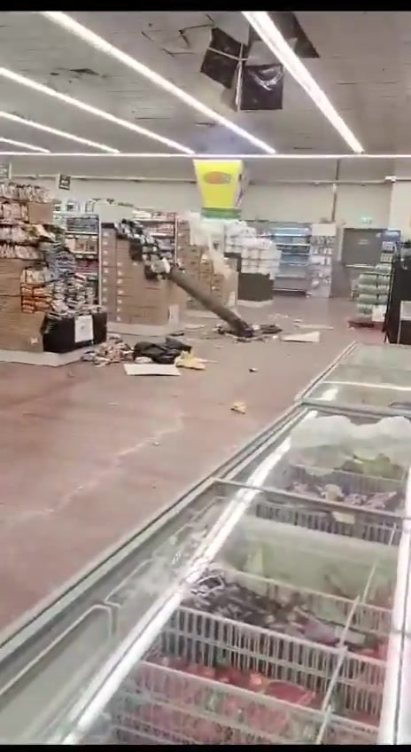 A large fragment of an intercepted rocket reportedly landed in a supermarket in Ashdod