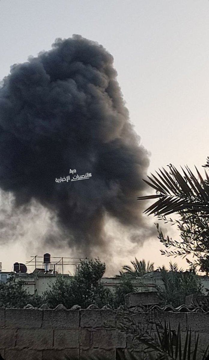 Airplanes launch a raid on the town of Al-Zawaida in the central Gaza Strip