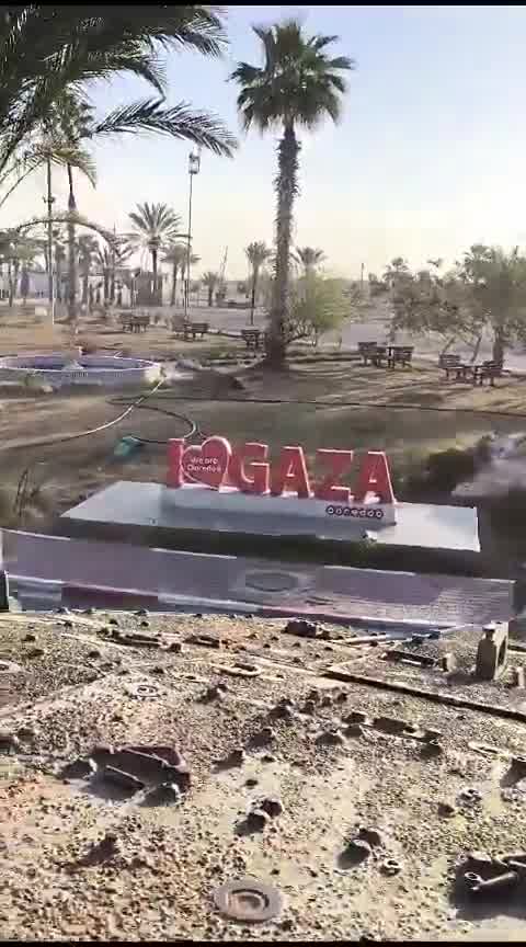 Israeli tank bulldozers Gaza sign as Israeli army captures Rafah crossing this morning
