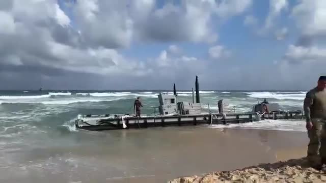 Part of the Gaza Pier, broken off and run aground up the coast, away from Gaza