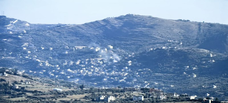 Artillery shelling the town of Kafr Kila in southern Lebanon.