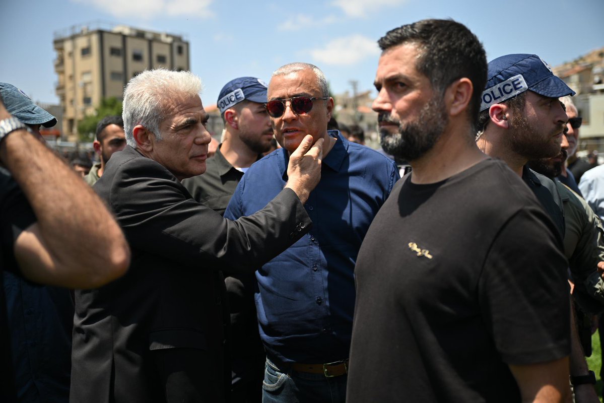 Opposition Leader Yair Lapid with Majdal Shams Mayor Dolan Abu Saleh (in black on right) Retaliation will be severe and it will reverberate throughout the Middle East. Likud ministers getting heckled: The kids are gone and you show up? Why is there still Beirut at all?