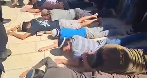 Religious Jews bow on the Temple Mount in the presence of National Security Minister Itamar Ben Gabir.