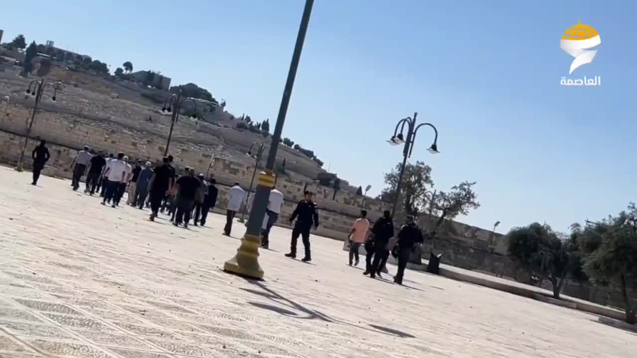 Settler groups storm the Al-Aqsa Mosque under the protection of forces.