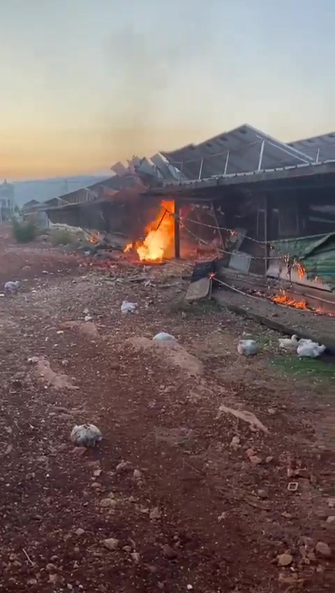 A rocket fired from Lebanon in this morning's Hezbollah attack struck a chicken coop in the Western Galilee community of Manot. Firefighters are working to extinguish a blaze sparked by the rocket impact