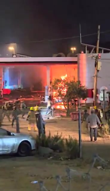 The moment of shooting at the perpetrator of the car bomb explosion at the Gush Etzion village junction near Hebron