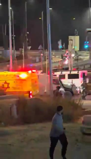 The moment of shooting at the perpetrator of the car bomb explosion at the Gush Etzion village junction near Hebron