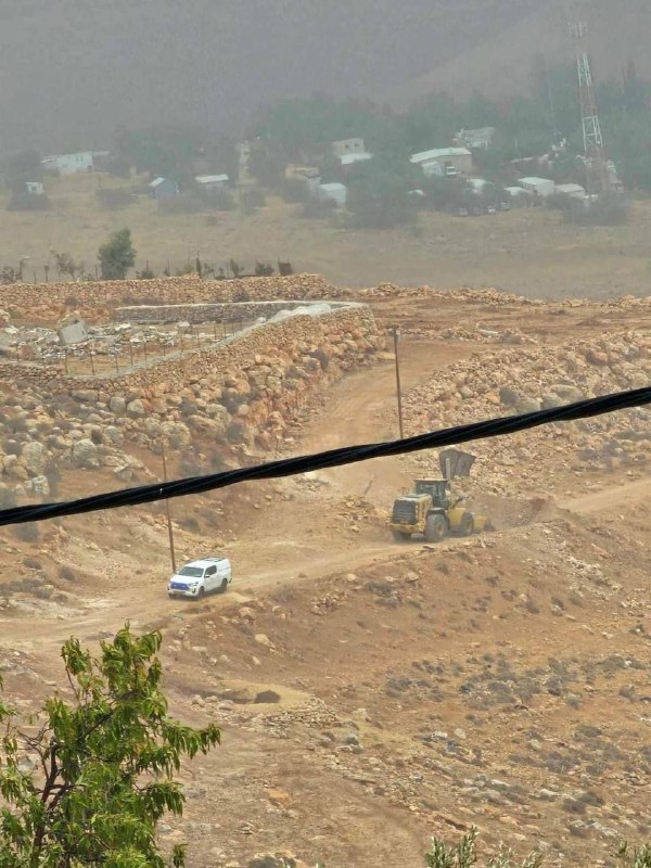 Bulldozers demolish agricultural facilities in the town of Duma, south of Nablus.