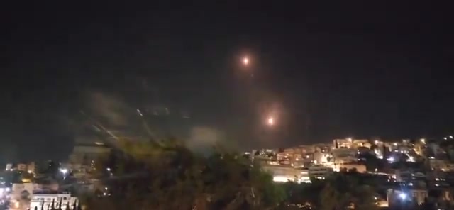 Interceptors being launched from near Haifa, against incoming Projectiles launched from Southern Lebanon