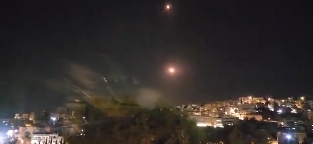 Interceptors being launched from near Haifa, against incoming Projectiles launched from Southern Lebanon