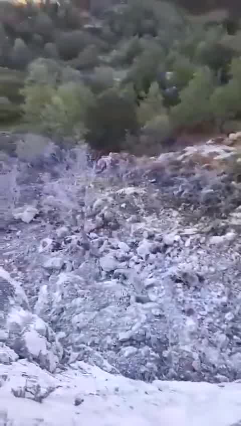 The damage after a raid on the outskirts of the town of Bint Jbeil, south Lebanon