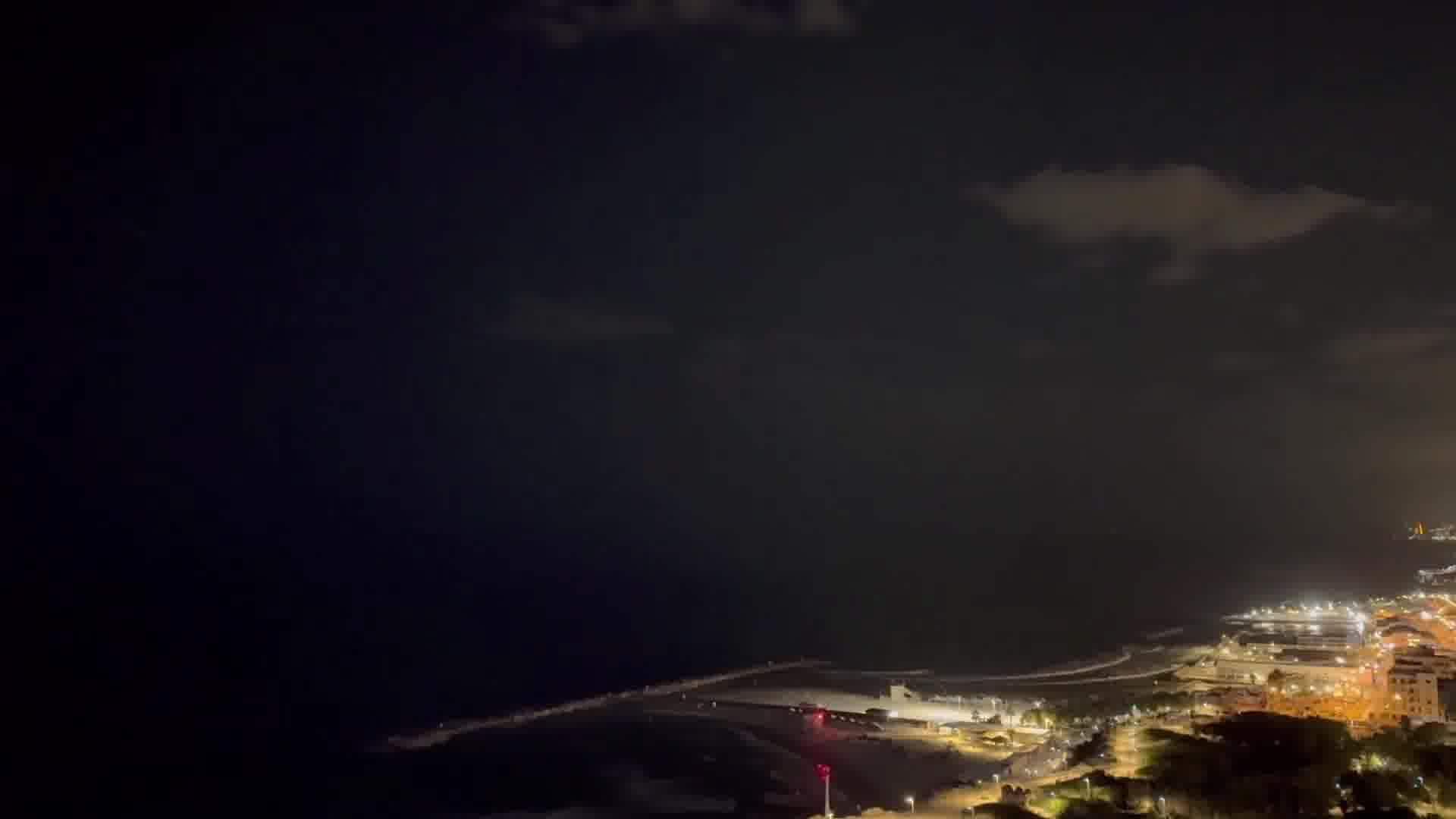 Multiple missile interceptors fly over Tel Aviv - followed by explosions over the Mediterranean Sea