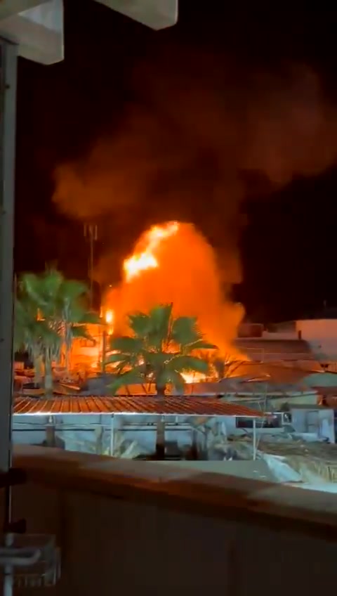 Video of the moments when planes bombed a tent sheltering displaced people in Al-Aqsa Martyrs Hospital in Deir al-Balah in the central Gaza Strip. The violent raid resulted in the deaths of 4 dead and a number of wounded.