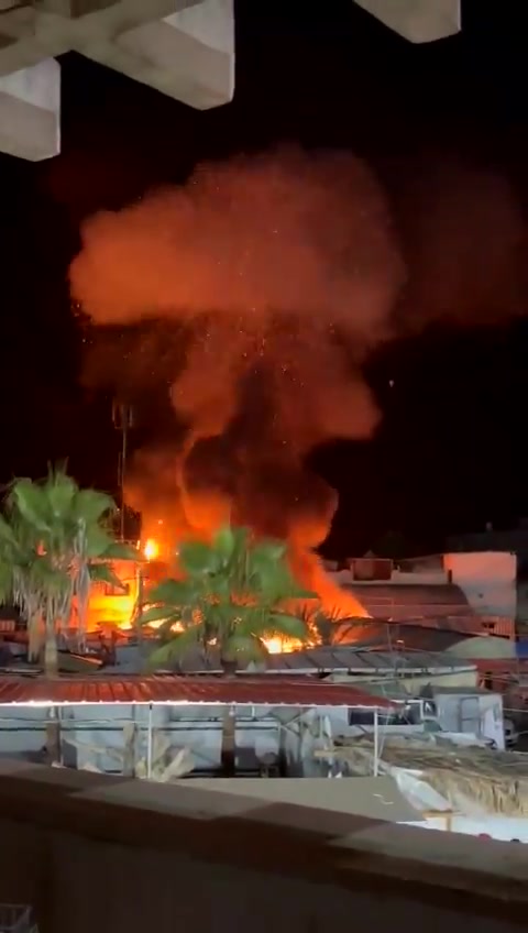 Video of the moments when planes bombed a tent sheltering displaced people in Al-Aqsa Martyrs Hospital in Deir al-Balah in the central Gaza Strip. The violent raid resulted in the deaths of 4 dead and a number of wounded.